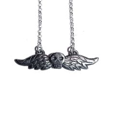 "A tiny death's head, often found adorning 17th century tombstones, is cast in solid sterling silver and hung on a patterned sterling chain. Pendant measures 1 3/16\" wide by 1/4\" high. Please note that the last image shows this necklace with the Taphophile necklace for size reference. I make each piece to order, so please allow 2-4 weeks for shipment. US orders ship via USPS Priority. International orders ship via USPS First Class with insurance." Gold Figaro Chain, Gold Pattern, Yellow Gold Pendants, Skull And Bones, Leaf Necklace, Tombstone, 17th Century, Cable Chain, Gold Pendant