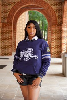 Wrap yourself in comfort and pride with our HBCU Cotton Chenille Logo Sweater. This sweater effortlessly combines cozy comfort with collegiate style, making it an essential addition to your wardrobe. Key Features: Premium Cotton Fabric: Made from high-quality cotton, this sweater offers exceptional softness and breathability, ensuring all-day comfort.Chenille Logo: The front features a beautifully crafted chenille logo that adds a touch of texture and sophistication, proudly displaying your HBCU Collegiate Team-colored Sweatshirt For Fall, College Team-colored Sweatshirt For Fall, Cotton Varsity Jacket For College In Fall, Fall Cotton Varsity Jacket For College, College Style Long Sleeve Varsity Jacket For Campus, Collegiate Cotton Varsity Jacket For Winter, Navy Winter College Sweater, Navy Winter Sweater For College, Collegiate Varsity Jacket For Campus In Fall