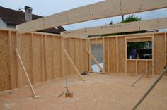 the inside of a house being built with wood framing