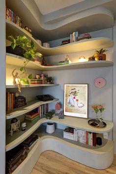 a corner shelf with books and plants on it