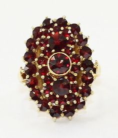 Heirloom Cluster Jewelry As Gift, Heirloom Cluster Jewelry Gift, Heirloom Cluster Jewelry For Gifts, Classic Red Cluster Jewelry, Antique 14k Gold Cluster Jewelry, Antique Multi-stone Cluster Jewelry, Yellow Gold Cluster Jewelry Hallmarked, Collectible Cluster Fine Jewelry, Yellow Gold Garnet Jewelry