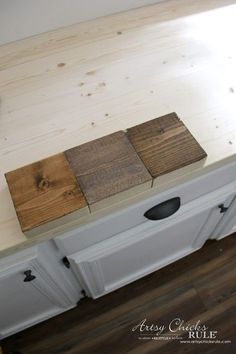 some wood pieces are sitting on top of a counter