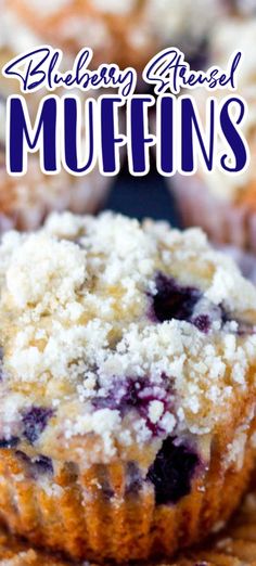 blueberry crumb muffins on a plate with fresh blueberries in the background