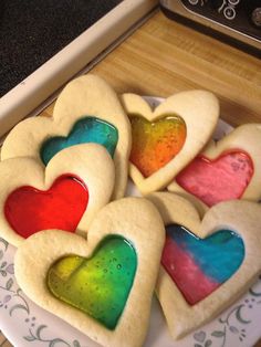 an image of valentine's day cookies on the app store page, with text that reads happy valentine's day stain glass sugar cookies use your favorite sugar cookie recipe