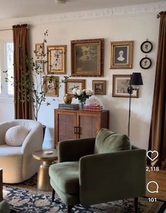 a living room filled with furniture and pictures on the wall