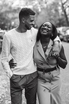 a man and woman standing next to each other