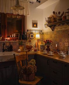 a kitchen filled with lots of clutter next to a sink and stove top oven