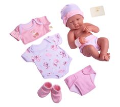 a baby doll with pink clothes and accessories