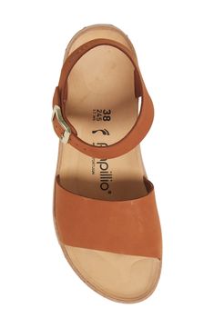 A contoured cork footbed supports the arches of your foot in this wedge sandal that delivers daylong comfort and beachy style. Style Name:Birkenstock Glenda Wedge Sandal (Women). Style Number: 6251134.