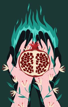 a pomegranate being held by two hands with flames coming out of it