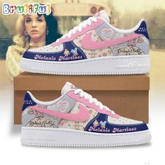 a pair of pink and blue air force sneakers with the image of a woman's face on it