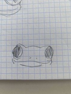 a drawing of a frog's eyes and nose