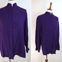 A posh and sophisticated top to be sure. This 90's silk Chinese style blouse in a dark moody eggplant purple is top notch quality. The shirt features a soft silk weave, stand collar, loop buttons and deep side splits going up to the waist. It has a lovely tunic style cut, and would look stunnin' with some wide leg linen pants. GARMENT MEASUREMENTS (in Inches) Bust: 42" Waist: 40" Hemline: 40" Shoulder Width: 17" Sleeve Length: 29" Length: 28" Estimated Best Fit: Size Small **all Measurements are taken with the garment lying flat, then doubled. Be sure to leave room for movement and comfort** CONDITION: VINTAGE GOOD: Good condition, some visible wear but no serious flaws to make note of. Condition Notes: LABEL: Milano  MATERIALS: 100% Silk SIZE LABEL: S *Please note that vintage size labels Fitted Purple Silk Tops, Purple V-neck Blouse With Buttons, Vintage Purple Long Sleeve Tops, Purple V-neck Formal Blouse, Purple V-neck Blouse For Formal Occasions, Purple Button-up Blouse For Fall, Purple Long Sleeve Blouse With Buttons, Formal Purple Silk Top, Purple Silk Top For Formal Occasions