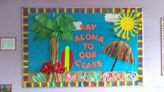 a bulletin board that says say aloha to our class with palm trees and surfboards