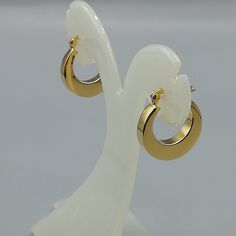 ONE PAIR of chunky sterling silver hoops plated in real gold. Dimensions: 20 x 21 x 5 x 4 mm These earrings are made of 925 hypoallergenic sterling silver plated in gold. Sent in a gift box. I can include a personal message from you if needed You are welcome to contact me at... bhavnakwintra1956@gmail.com For more beautiful pieces from my shop, please browse 👇 TOE RINGS: https://www.etsy.com/your/shops/TheSilverGame/tools/listings/section:27020628,view:table EAR HOOPS: https://www.etsy.com/your Modern Hoop Clip-on Earrings As Gift, Classic Metal Hoop Earrings As Gift, Gold Small Hoop Clip-on Earrings For Anniversary, Cadmium-free Huggie Hoop Earrings Gift, Gift Huggie Hoop Earrings, Elegant Cadmium-free Hoop Earrings As Gift, Elegant Hypoallergenic Hoop Earrings As Gift, Modern Gold Hoop Clip-on Earrings, Gift Gold Plated Hoop Earrings With Shiny Finish