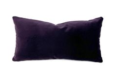 a purple pillow on a white background with no one in the photo to describe it