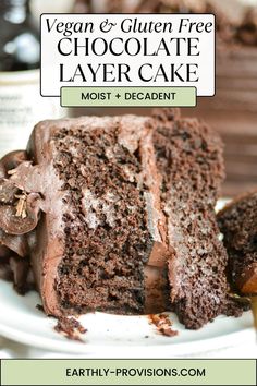 a chocolate layer cake on a plate with the words vegan and gluen free chocolate layer cake