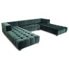 a green sectional sofa with chrome legs and footrests on an isolated white background