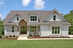 a large white house with lots of windows