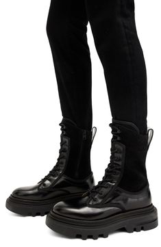 Take your off-duty style to the next level with this leather-and-suede lace-up boot grounded by a sturdy lug sole. 2 1/4" heel; 1 1/2" platform 9 1/4" shaft Lace-up style; side zip closure Leather upper and lining/synthetic sole Made in Portugal Edgy Leather Lace-up Mid-calf Boots, Edgy Leather Lace-up Boots For Streetwear, Edgy Leather Lace-up Boots With Lug Sole, Edgy Leather High Ankle Combat Boots, Leather Lace-up Boots For Streetwear, Edgy High Ankle Leather Combat Boots, Edgy Leather Boots With Lug Sole, High-top Heeled Boots With Lug Sole For Streetwear, Ankle-high Leather Lace-up Boots For Streetwear