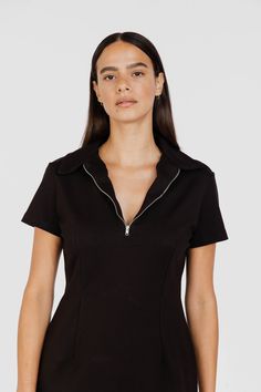 This Charlie's Angels-esque form fitting zip-up mini dress is the perfect staple for your wardrobe. Featuring seams along the waistline for the most flattering look, dress this piece up with a tall boot for a sexy outing or transition to daytime with a white sneaker. Length (inches) XS 28 S 29 M 30 L 30.5 XL 30.5 XXL ﻿31 Charlie's Angels, Charlies Angels, Tall Boot, Tall Boots, Dresses Xs, Zip Up, White Sneaker, Final Sale, Stretch Fabric