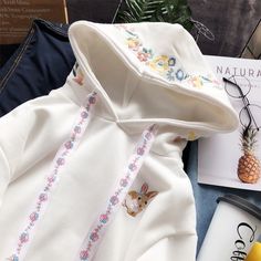 Sweet Rabbit Flowers Hoodie PN1890 ●Size: Length 54 cm,bust 98 cm,shoulder 51 cm,sleeve 52 cm. ●Material:cotton ●About Shipping: We attach great importance to the orders of each customer and parcel delivery. 1.Processing time: 2-3 business days. 2.Shipping time: 10-15 business days to US, please allow 3-4 weeks shipping to other country.(Shipping times can be affected by variable customs clearance times or public holidays.) Cute Cotton Hooded Outerwear, Cute Long Sleeve Cotton Hooded Jacket, Cute Cotton Hooded Jacket With Long Sleeves, Cotton Hooded Sweater With Drawstring, Cute Cotton Hooded Jacket For Fall, White Hooded Cotton Sweater, White Cotton Hoodie Sweater, Cute Long Sleeve Top With Drawstring Hood, Cute Cotton Hoodie With Drawstring Hood