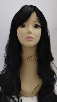 "Long wavy wig featuring a fixed center skin part and bangs. Inside cap has 2 combs and adjustable elastic straps for a secure fit. Heat resistant up to 350F. Color: Black Style: 22\" inches, Long and Wavy with Bangs Circumference: Default at 21\" with adjustable cap (max 22\") Materials: Heat Resistant Synthetic Wig Fibers All sales are final. Please read all store policies before purchasing." Wavy With Bangs, Long Wavy Wig, Wavy Wig, Wig With Bangs, Synthetic Wig, Wigs With Bangs, Black Style, Synthetic Wigs, Heat Resistant