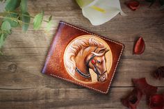 Internal structure: one big money bag, three small card bags, two big card bags. The design of the wallet comes from galloping horses, heroic and fit galloping horses on the ground, very cool, wanting a wallet is related to the horse. The unique leather carvings and retro color materials make the wallet a unique artwork. It takes 14 hours to make the wallet by hand. If customers and friends need to buy more than 3, you need to notify the seller in advance to provide you with services. Each walle Hand Tooled Bifold Wallet As Gift, Vintage Hand-tooled Wallets As Gift, Leather Badge Holder, Men Art, Leather Engraving, Vintage Wallet, Wallets For Men, Horse Pattern, Leather Carving