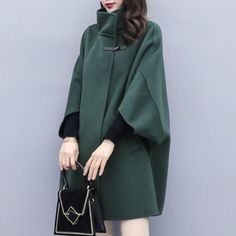 Brand Name: RoseticClothing Length: RegularMaterial: CashmereOrigin: CN(Origin)Season: WinterStyle: Office LadyModel Number: 31954992Age: Ages 18-35 Years OldCollar: Turn-down CollarClosure Type: zipperSleeve Style: RegularSleeve Length(cm): FullRelease Date: FW2021Type: CloakOuterwear Type: Wool & BlendsGender: WOMENDecoration: SplicedMaterial Composition: PolyesterPattern Type: SolidModel: CapeLength: Mid-LengthSleeve Length: Three-QuarterSleeveNeckline: LapelClosure: OneButtonDetachable Colla Green Cape Outerwear For Fall, Green Fall Cape Outerwear, Green Cape For Fall, Green Winter Cape Outerwear, Elegant Green Stand Collar Outerwear, Elegant Green Outerwear With Stand Collar, Oversized Green Cape Outerwear, Elegant Patchwork Outerwear For Fall, Chic Patchwork Winter Outerwear