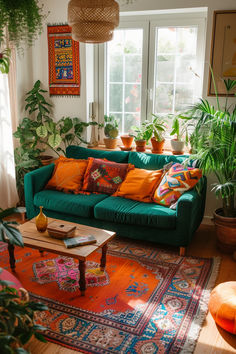 a living room filled with lots of green couches and colorful rugs on top of a wooden floor