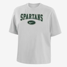 Made with soft cotton, this roomy Michigan State tee gives you a relaxed look without feeling too oversized and lets your cheer on your school in comfort. Casual Short Sleeve T-shirt With University Logo, White Short Sleeve Top With University Logo, Nike Relaxed Fit College Tops, Nike Relaxed Fit Tops For College, White Relaxed Fit T-shirt For School, Collegiate White T-shirt With University Logo, Casual Cropped T-shirt With Letter Print For College, Nike White T-shirt For College, White Crew Neck T-shirt With University Logo