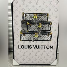 the louis vuitton card has three suitcases on it and is in front of a white background