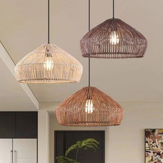 three light fixtures hanging from the ceiling