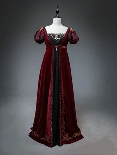 This Bridgerton Dress is a stunning Regency Burgundy Velvet Ball Gown, perfect for any special occasion. The bodice is fitted with a flattering sweetheart neckline and the skirt is full with a slight train, giving you a regal, elegant look. The dress is made from a luxurious velvet fabric that is soft and comfortable to wear, and is fully lined for added comfort and warmth. The dress also features a corset back closure for a perfect fit. This dress is available in plus sizes, so you can be ... 1810s Ball Gown, Gothic Regency Dress, Period Accurate Clothing, Red Regency Gown, Red Regency Dress, Black Regency Dress, Regency Era Fashion Gowns, Bridergton Outfit, Regency Dress Aesthetic