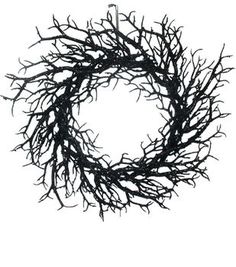 a black and white photo of a wreath made out of branches on a white background