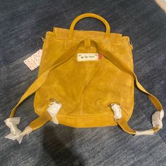 Brand New With Tags, Never Used, In Excellent Condition. Currently Out Of Stock And No Longer Available For Purchase On Freepeople.Com Casual Yellow Softback Bag, Yellow School Backpack With Pockets, Casual Yellow Backpack For Daily Use, Yellow Satchel With Removable Pouch For School, Yellow Satchel Bag With Pockets, Yellow Bags With Leather Handles For On-the-go, Yellow School Satchel With Removable Pouch, Large Capacity Yellow Backpack Shoulder Bag, Yellow Large Capacity Standard Backpack