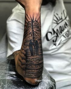 a person with a tattoo on their arm