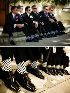 a group of men wearing black and white checkered socks sitting next to each other