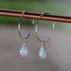 Interchangeable Tiny Rainbow Moonstone Teardrop Minimalist Dangle Earrings- Sterling Silver or Gold Filled The dangles are interchangeable with other dangles sold in my shop, so you can choose to purchase JUST a pair of the dangle portion (if you already have the hoops!) or the hoops and dangle combination for a complete set of earrings. See listing photos for the two parts. MATERIALS: ❀ Your choice of 17mm sterling silver hoops or Gold Filled Hoops ❀ Dangle portion is made of 8 mm rainbow moons Diy Wire Earrings, Interchangeable Earrings, Gold Filled Hoops, Earrings Inspiration, Moonstone Earrings, Hand Stamped Jewelry, Stamped Jewelry, Sterling Silver Hoops, Glass Earrings