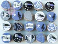 cupcakes decorated with musical instruments and stars