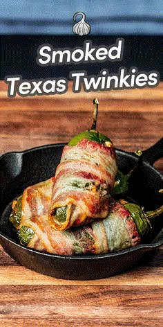 bacon wrapped stuffed peppers in a cast iron skillet with the title smoked texas twinkies