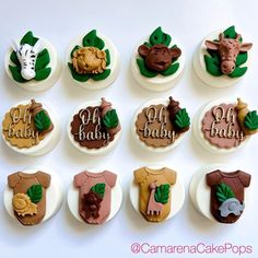 baby shower cupcakes decorated with fondant animals and leaves