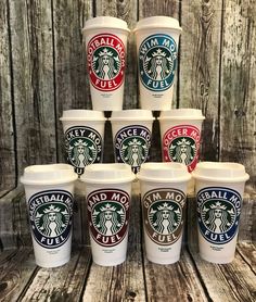 six cups of starbucks coffee are stacked on top of each other