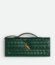 • Intrecciato leather top handle clutch with metallic knot closure • Six card slots, one additional pocket Leather Bucket Hat, Green Clutches, Green Shop, Bottega Veneta Intrecciato, Leather Bucket, Bags Designer Fashion, Green Bag, Green Leather, Long Wallet