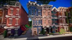 an image of some very colorful buildings in minecraft