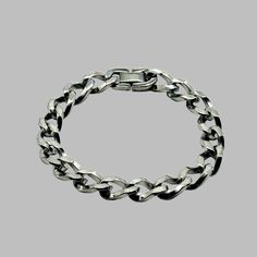 Twisted Chain Link Bracelet length: 8.5 inches width: 10mm thickness: 3mm clasp : fold over material: 304 stainless steel Classic Stainless Steel Cuban Link Bracelet, Formal Cuban Link Metal Bracelets, Formal Cuban Link Metal Bracelet, Formal Stainless Steel Cuban Link Bracelet, Classic Stainless Steel Chain Bracelet For Formal Occasions, Classic Silver Stainless Steel Chain Bracelet, Stainless Steel Link Bracelets For Formal Occasions, Classic Stainless Steel Bracelet With Curb Chain, Formal Stainless Steel Chain Link Bracelets