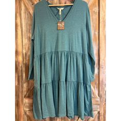 Elevate Your Wardrobe With This Charming Nwt Matilda Jane Teal Dress In Size Xxl. Perfect For Both Casual Outings And Semi-Formal Events, Its Tiered Ruffle Design Adds A Touch Of Whimsy To Your Look. The Long Sleeves Make It Versatile For Various Seasons. Ideal For Brunches, Garden Parties, Or A Day At The Office, This Dress Combines Comfort With Boho-Chic Style. Its Flowing Silhouette Flatters All Body Types, Making You Feel Confident And Stylish. Style: Tiered Dress, Ruffle Dress, Boho, A-Line Casual Long Sleeve Flowy Tiered Dress, Blue Casual Tiered Dress With V-neck, Blue Casual V-neck Tiered Dress, Casual Blue V-neck Tiered Dress, Green Dress Flowy, Best Dress, Ruffle Design, Casual Workwear, Jane Dress