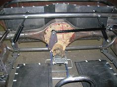 the inside of an old car with metal parts