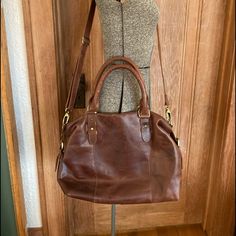 The Leather Store Brown Leather Weekender Bag Great Condition 17” Across 11” Tall Elegant Leather Weekender Bag With Adjustable Strap, Leather Crossbody Weekender Bag With Top Handle, Elegant Weekender Bag With Leather Backing For Everyday Use, Leather-backed Crossbody Satchel For On-the-go, Classic Leather-backed Satchel Hobo Bag, Elegant Leather-backed Travel Bag For Everyday Use, Brown Crossbody Weekender Bag, Leather Store, Leather Weekender Bag