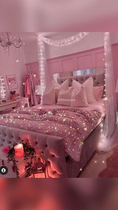 a bedroom with pink and white decor in the night time, it looks like someones bed is made up